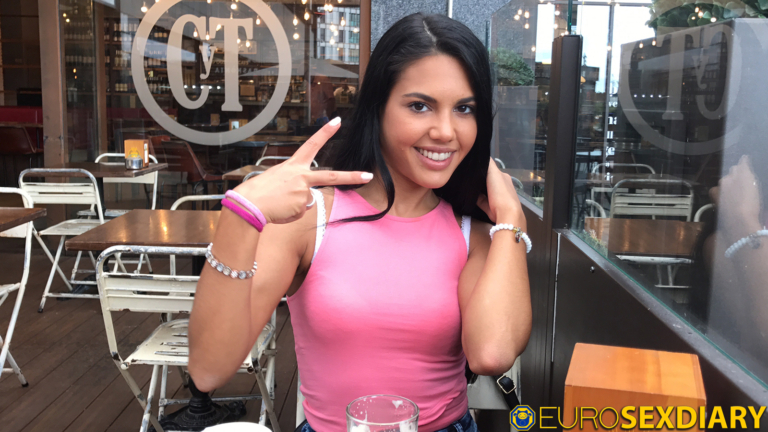 Making peace signs at dinner date